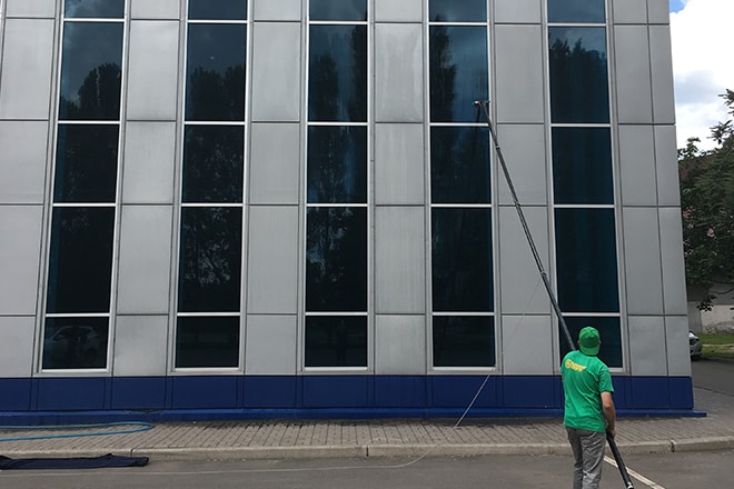 миття фасадів із землі